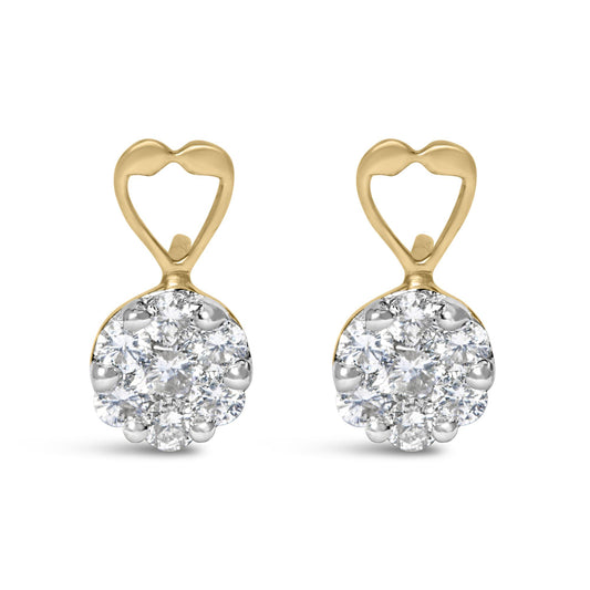 Front view of yellow metal earrings with heart-shaped tops and round clusters of white gemstones in prong settings.