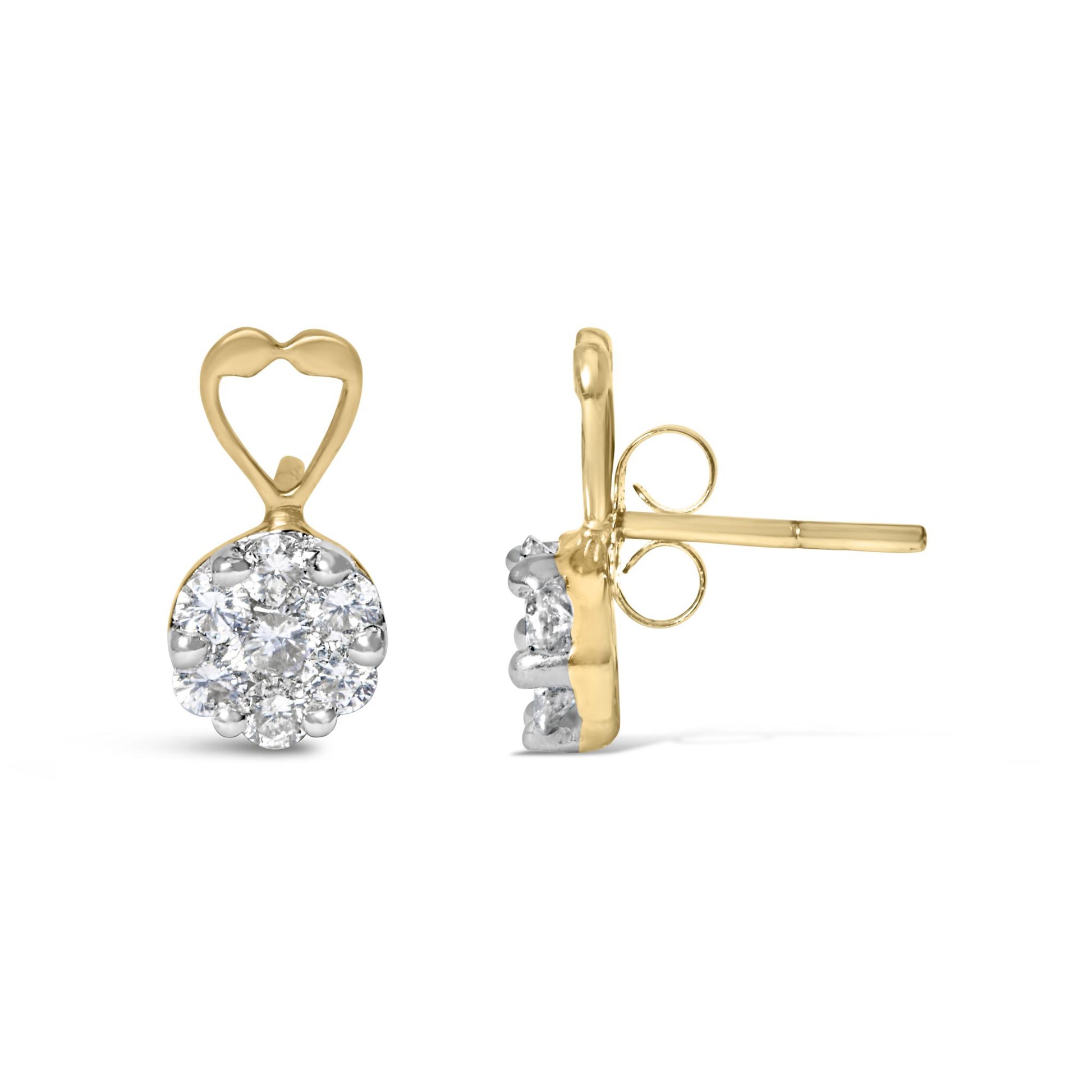 Front and side view of yellow metal earrings with heart-shaped upper part and round cluster of white gemstones in prong setting.