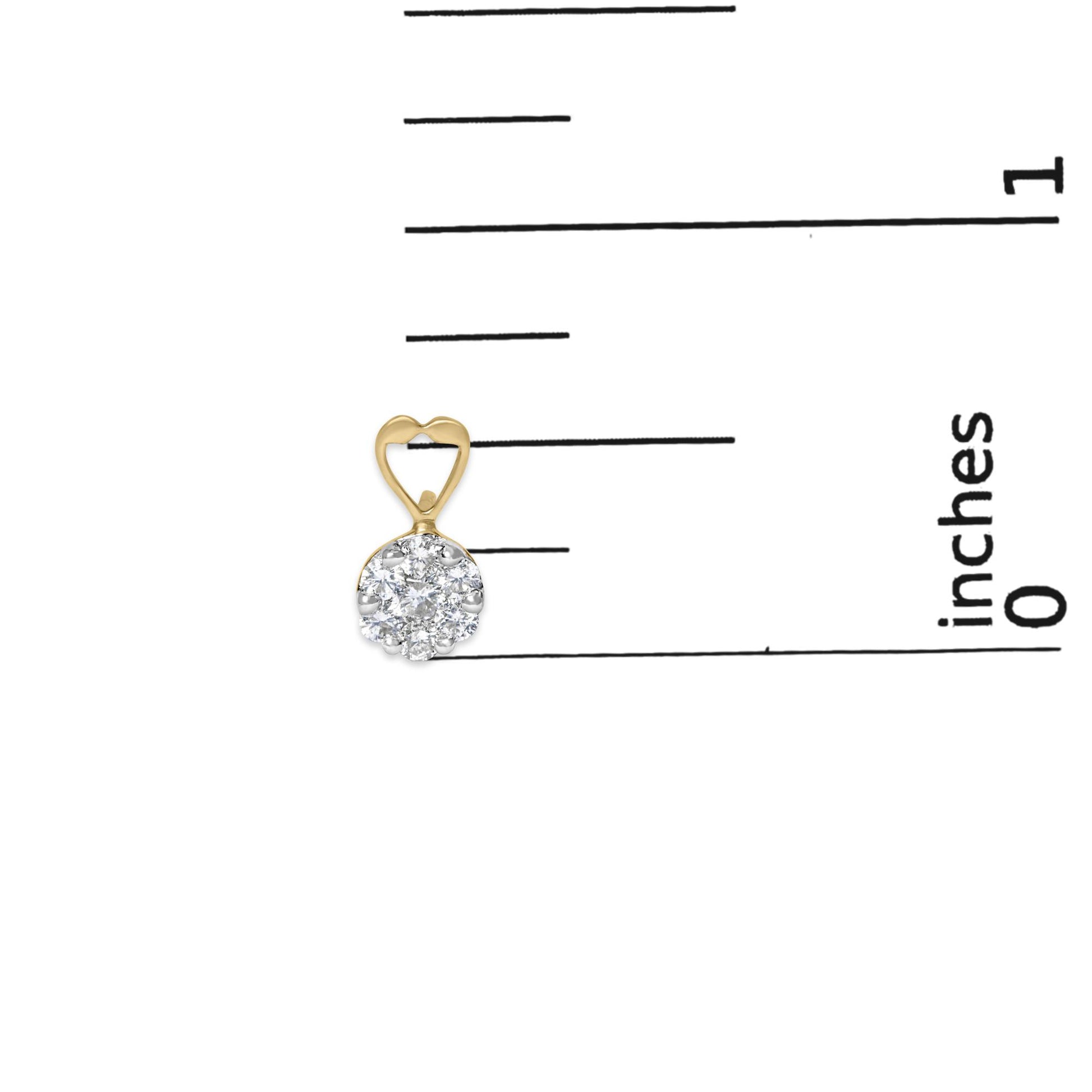Single yellow metal earring with round white gemstones in prong setting, photographed on a ruler for size reference.