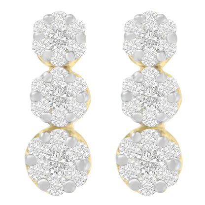 Pair of yellow metal earrings with three clusters of white round gemstones in prong setting, front view.