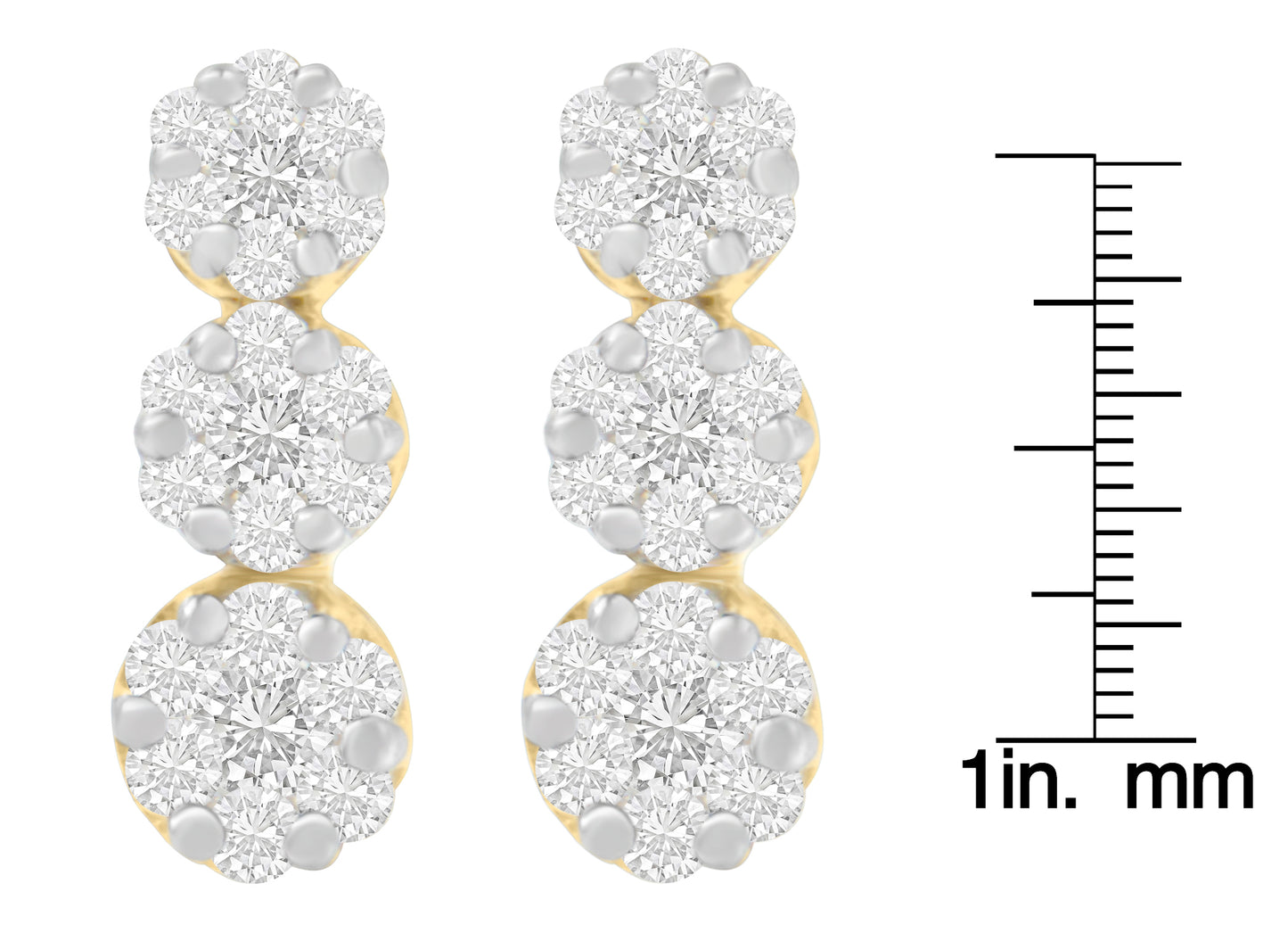 Pair of yellow metal earrings with clusters of round white gemstones in prong settings, photographed from the front, shown next to a ruler for size reference.