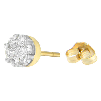 Close-up side view of a yellow metal stud earring with white round gemstones in prong setting and its backing displayed separately.