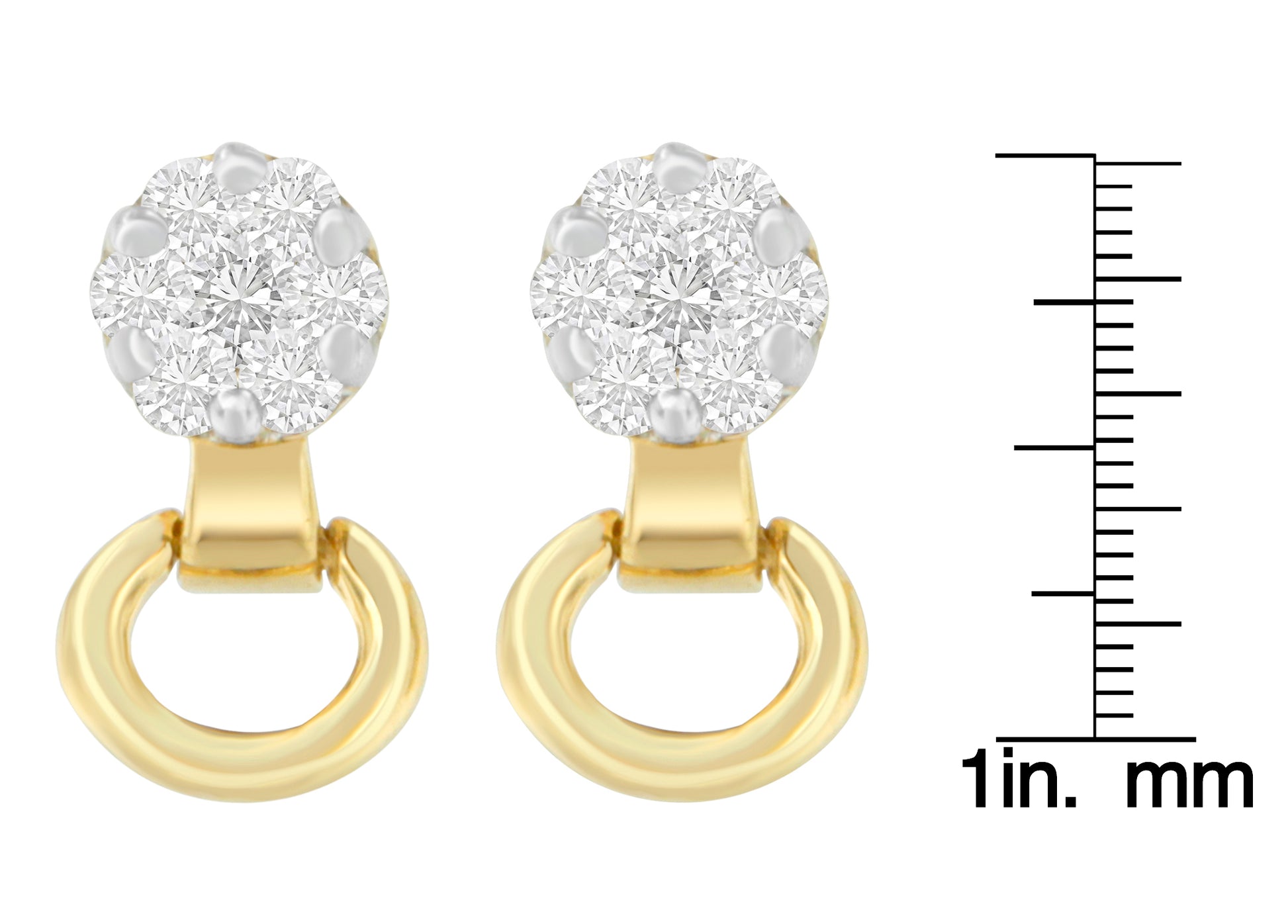 Front view of yellow metal earrings with round white gemstones in prong settings, shown next to a ruler for size reference.