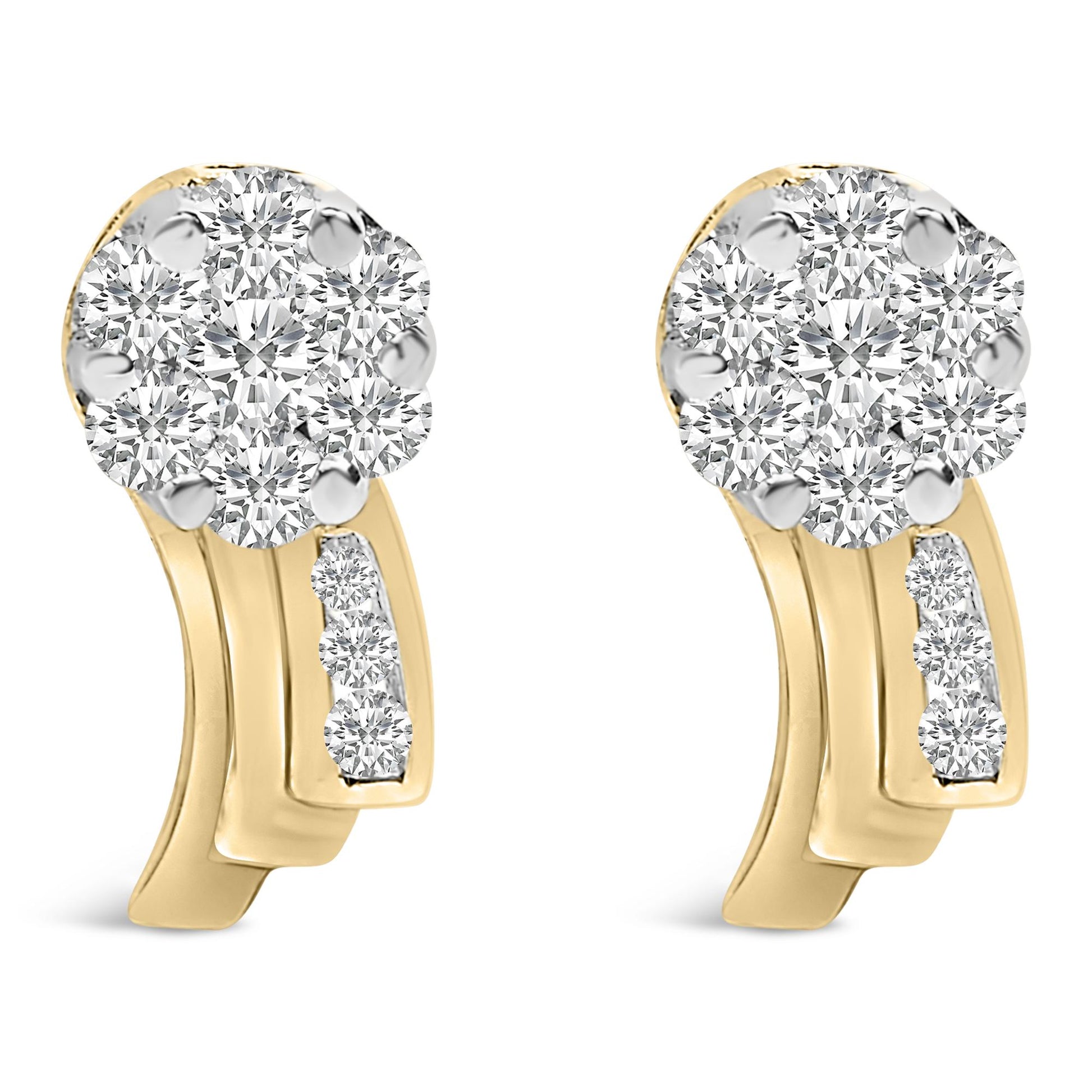 Front-facing close-up of a pair of yellow metal earrings with cluster of round white gemstones in prong settings and additional white gemstones set along the curved base.
