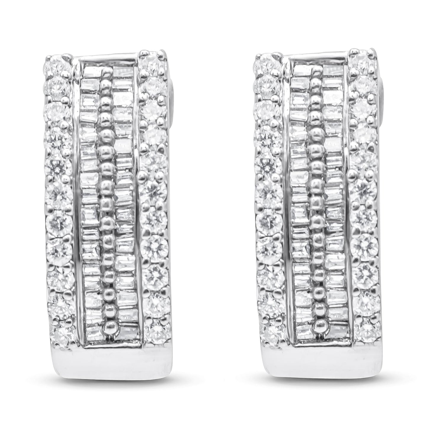 Front-facing view of white metal earrings featuring rows of round white gemstones in pave settings on the outer edges and baguette-shaped white gemstones in channel settings in the center.