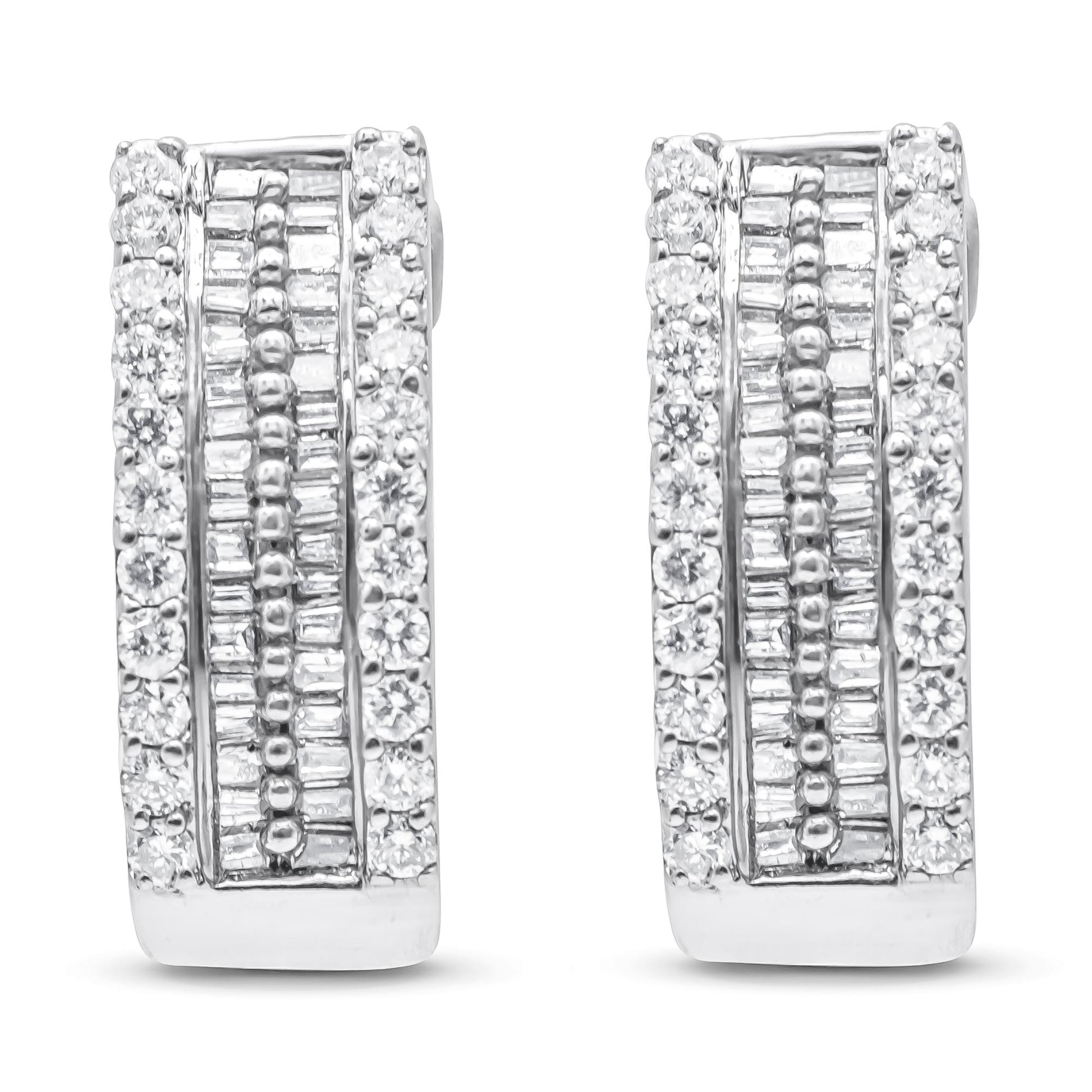 Front-facing view of white metal earrings featuring rows of round white gemstones in pave settings on the outer edges and baguette-shaped white gemstones in channel settings in the center.