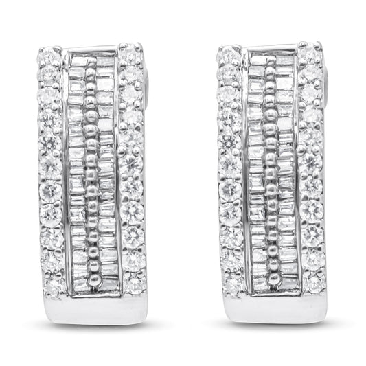 Front-facing view of white metal earrings featuring rows of round white gemstones in pave settings on the outer edges and baguette-shaped white gemstones in channel settings in the center.