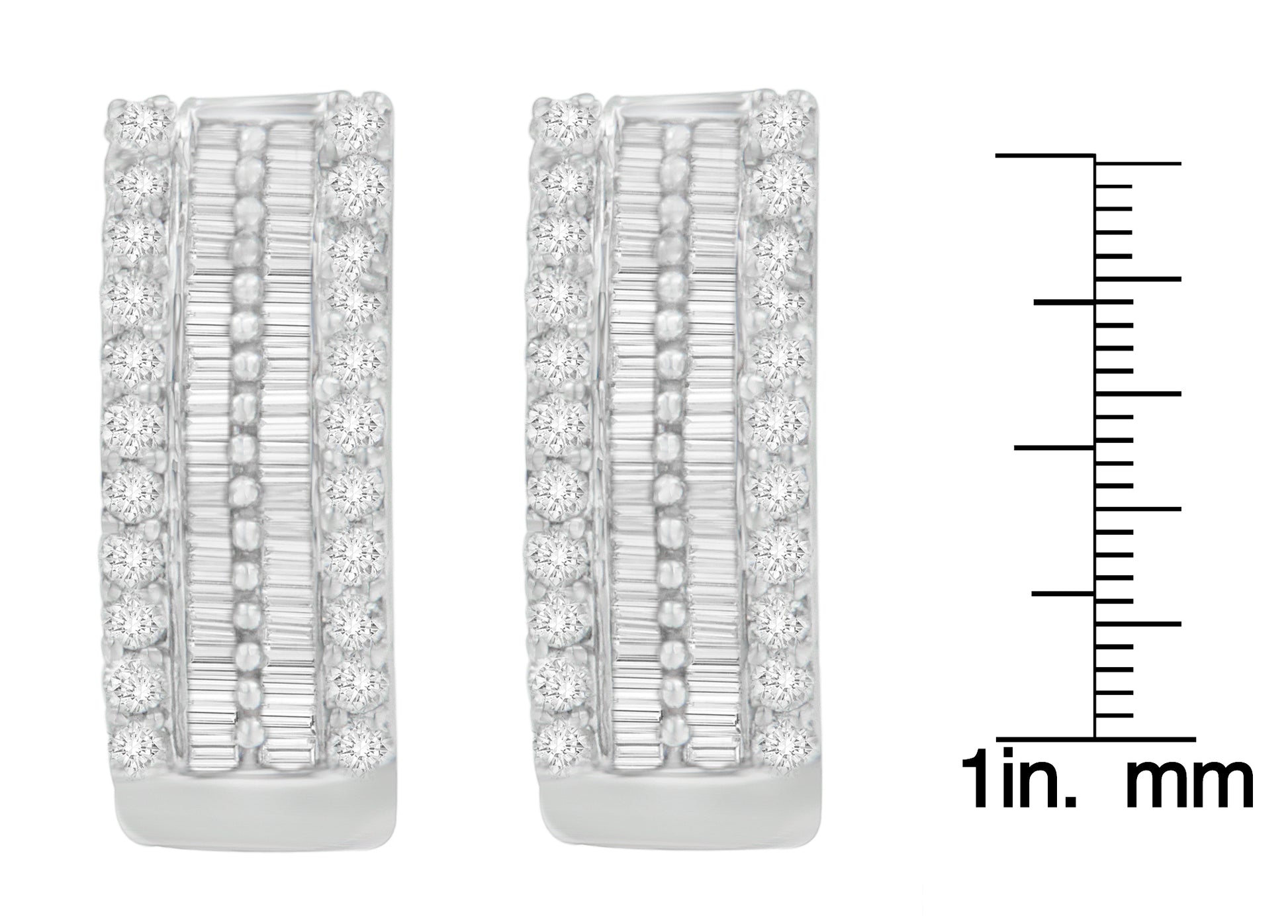Pair of white metal earrings with a combination of round pave set white gemstones on the edges and channel set baguette white gemstones in the center, shown in a front-facing view next to a ruler for size reference.
