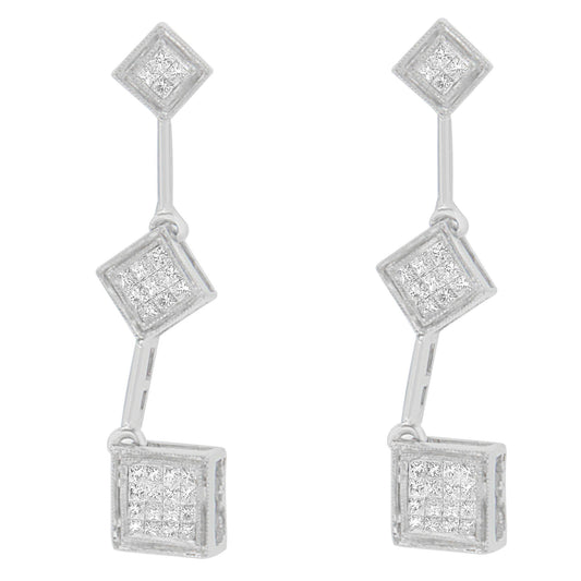 Front view of white metal drop earrings featuring three connected square sections, each set with multiple white gemstones in a princess shape and invisible setting.