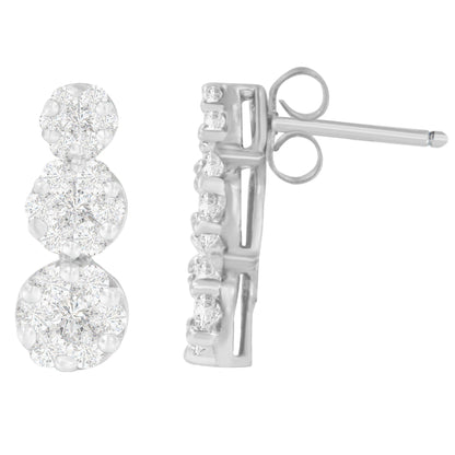 Close-up front and side views of white metal earrings with round white gemstones in prong settings.
