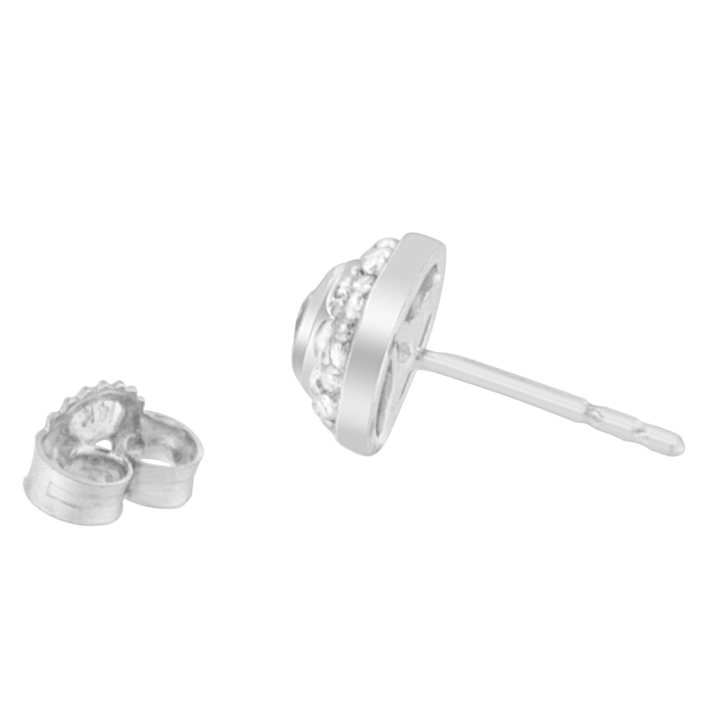 Close-up side angle of a white metal stud earring with a round white gemstone centerpiece in bezel setting, surrounded by smaller round white gemstones in prong setting, with a separate earring back displayed beside it.