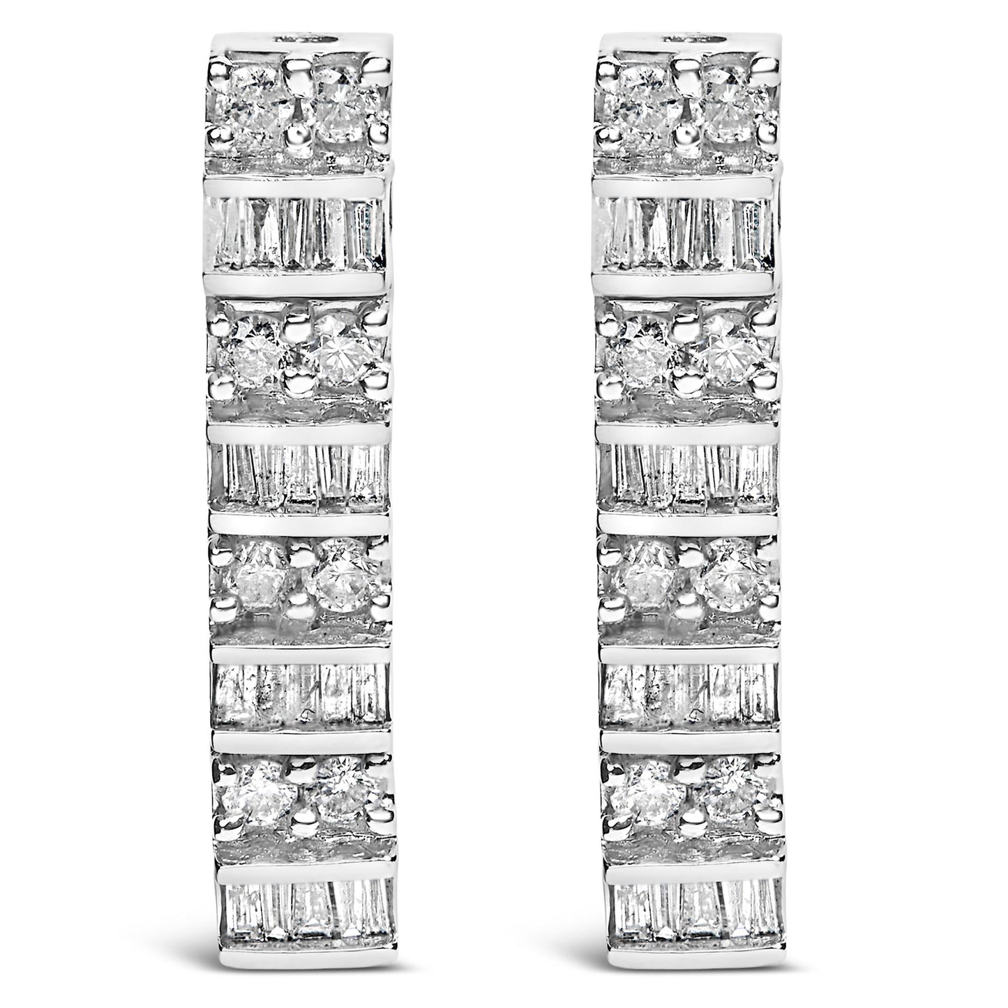 Front-facing view of white metal earrings with alternating rows of round white gemstones in prong settings and baguette white gemstones in channel settings.