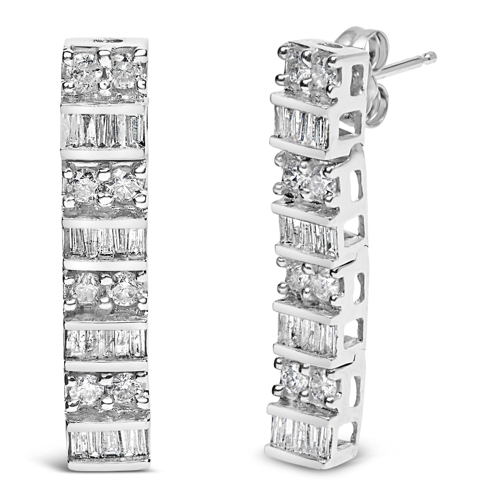 Pair of white metal earrings with alternating rows of round-shaped prong-set white gemstones and baguette-shaped channel-set white gemstones, shown from front and angled side views.