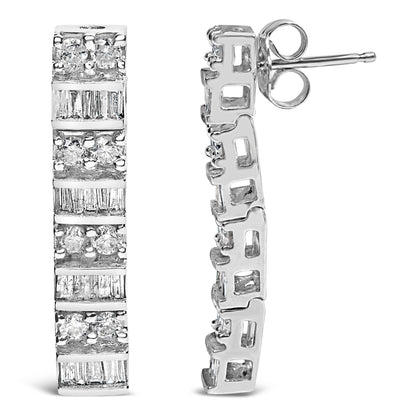 Close-up front and side views of white metal hoop earrings featuring alternating rows of round prong-set and baguette channel-set white gemstones.