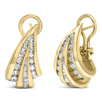 Close-up shot of a pair of yellow metal earrings with overlapping curved shapes, featuring channel-set white round and baguette gemstones, displayed against a white background.