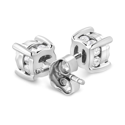 Close-up front angle of a pair of white metal stud earrings with round white gemstones in miracle and channel settings.