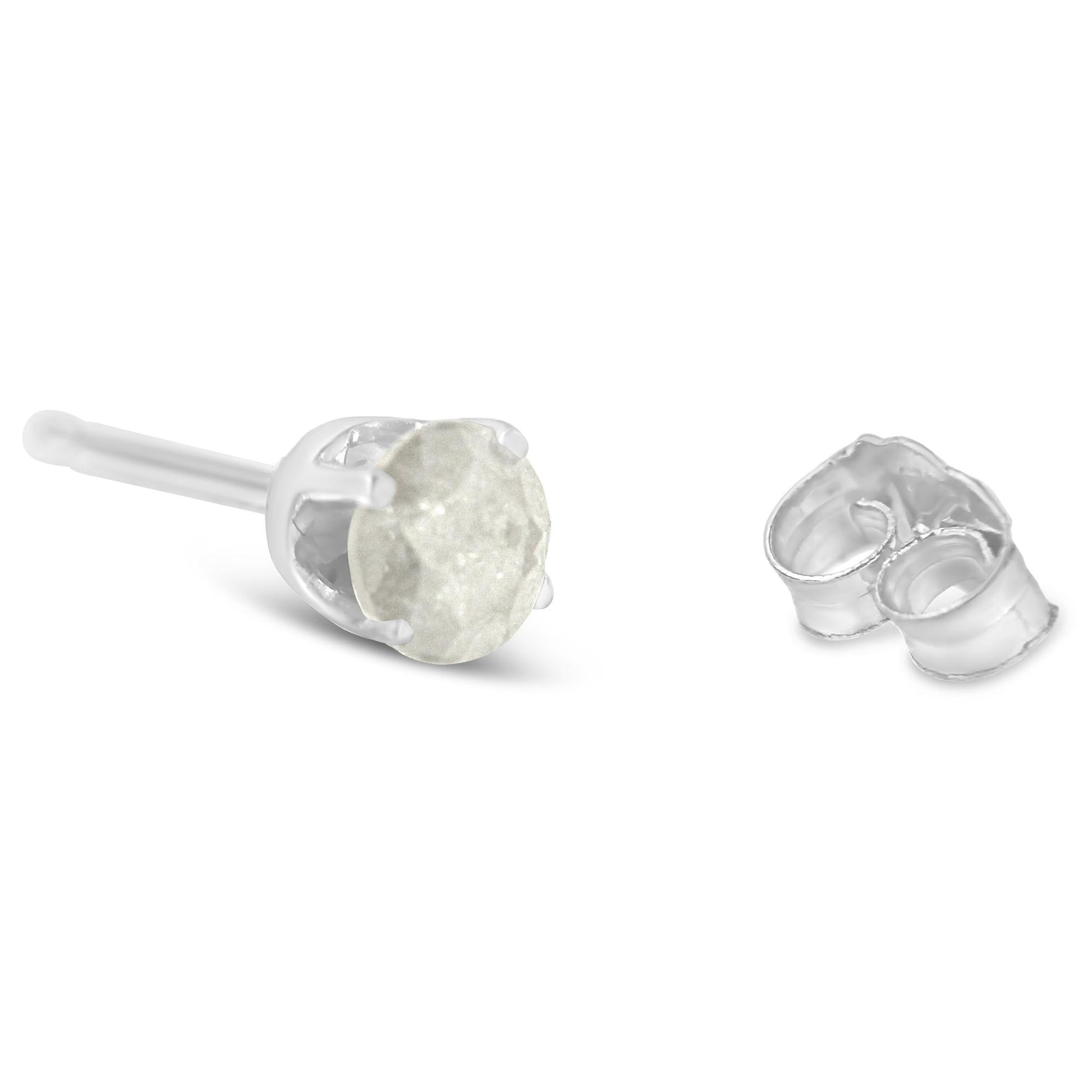 Close-up front angle of a white metal stud earring with a round prong-set white gemstone and a separate earring back.