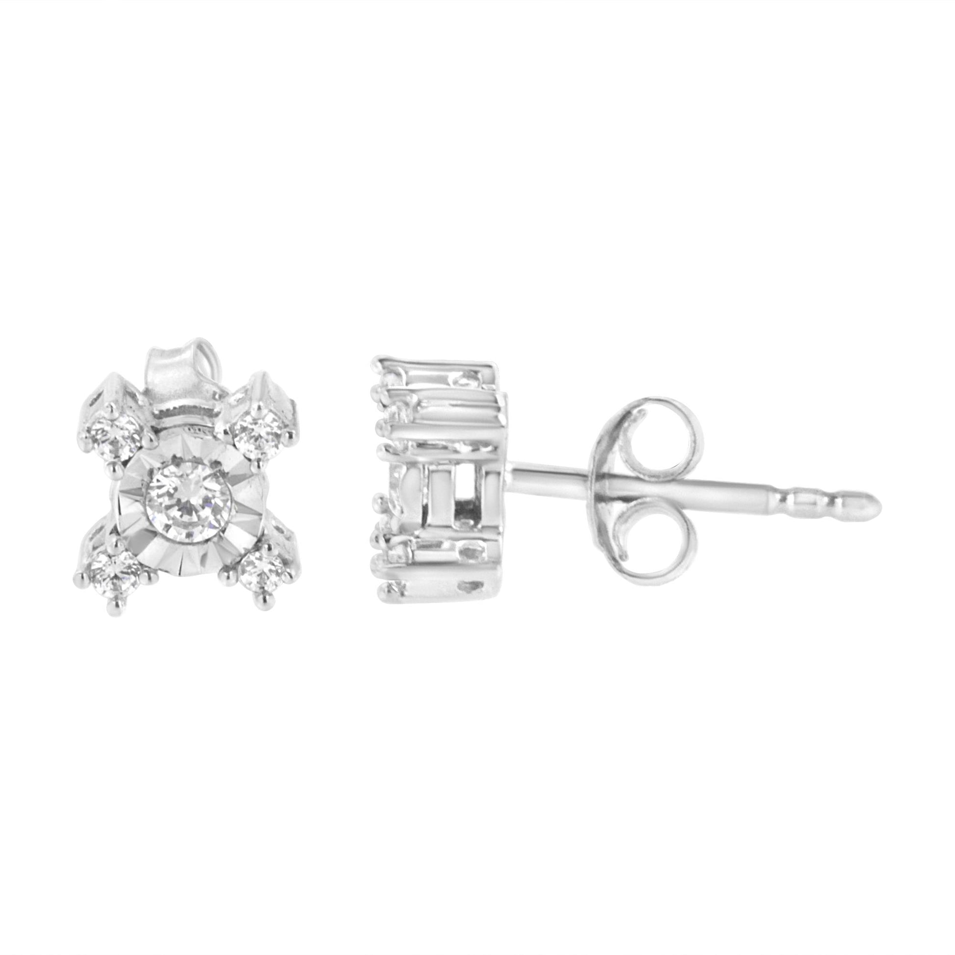 Pair of white metal stud earrings with round white gemstones in miracle and prong settings, shown from front and side angles.