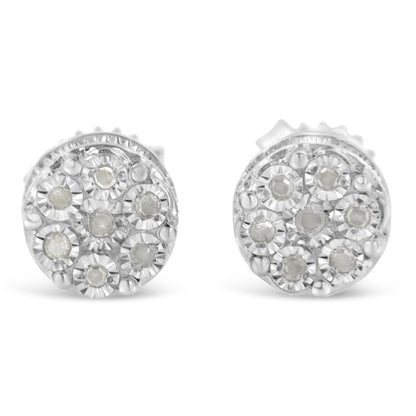 Pair of white metal round earrings with multiple round white gemstones set in a cluster, front-facing angle.