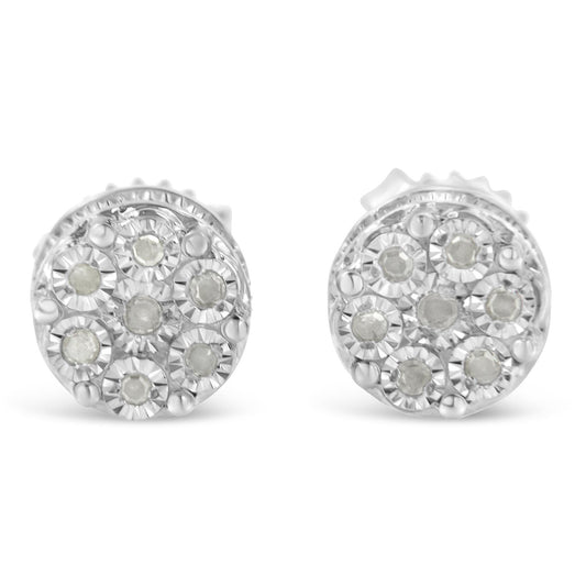 Pair of white metal round earrings with multiple round white gemstones set in a cluster, front-facing angle.