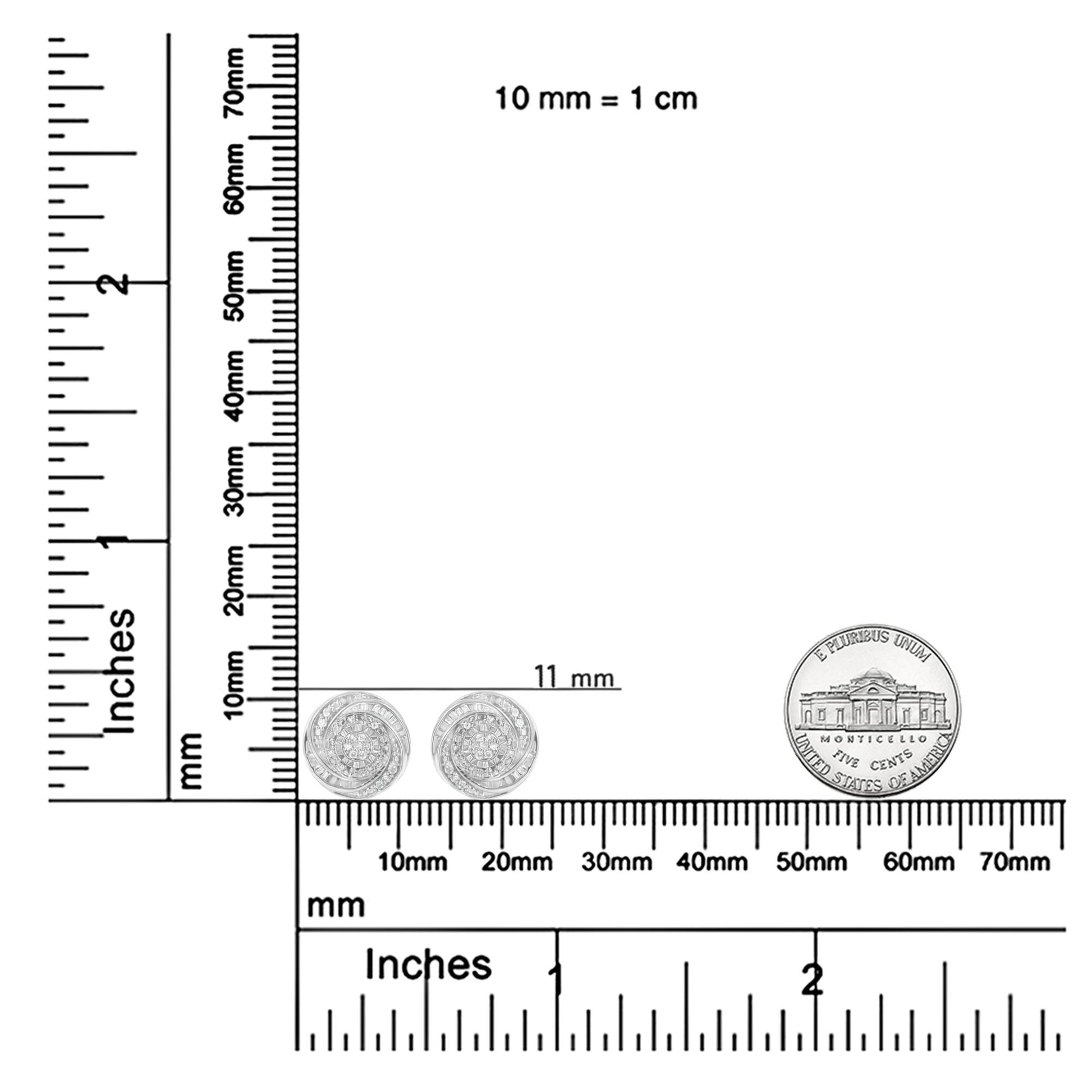 Close-up image of round white gemstone and baguette white gemstone earrings set in white metal, displayed on a ruler for size reference.