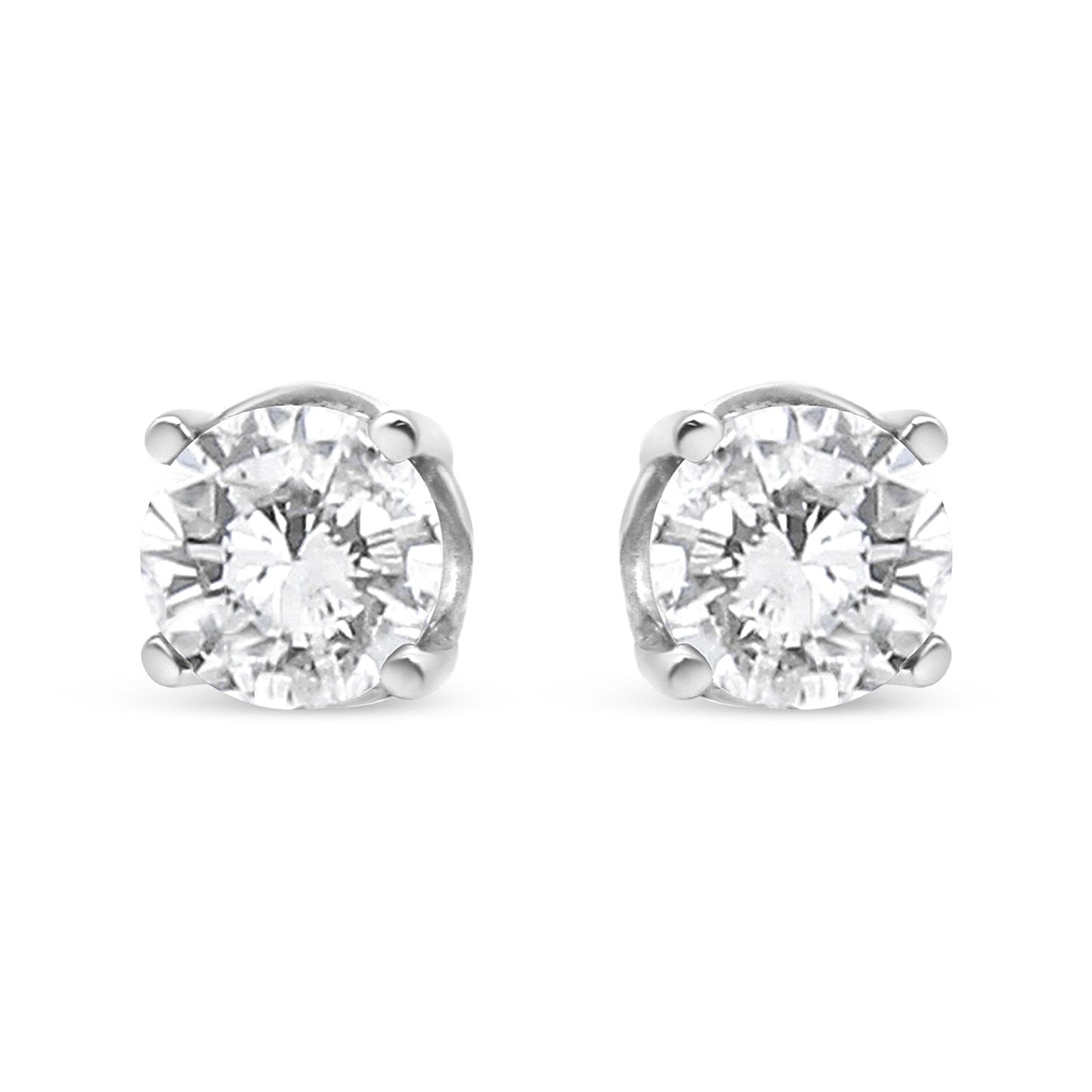 Front view of a pair of white metal stud earrings featuring round white gemstones in a four-prong setting.