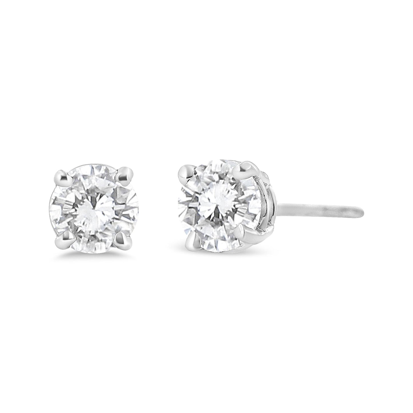Close-up front and side angle of white metal stud earrings with round white gemstones set in four-prong settings.