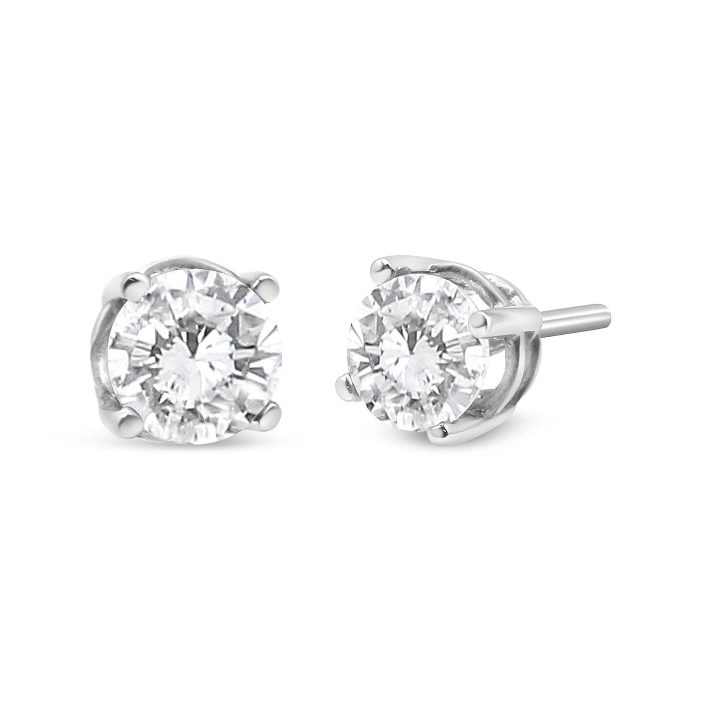 Pair of white metal stud earrings with round white gemstones in four-prong settings, shown from a front and side angle.