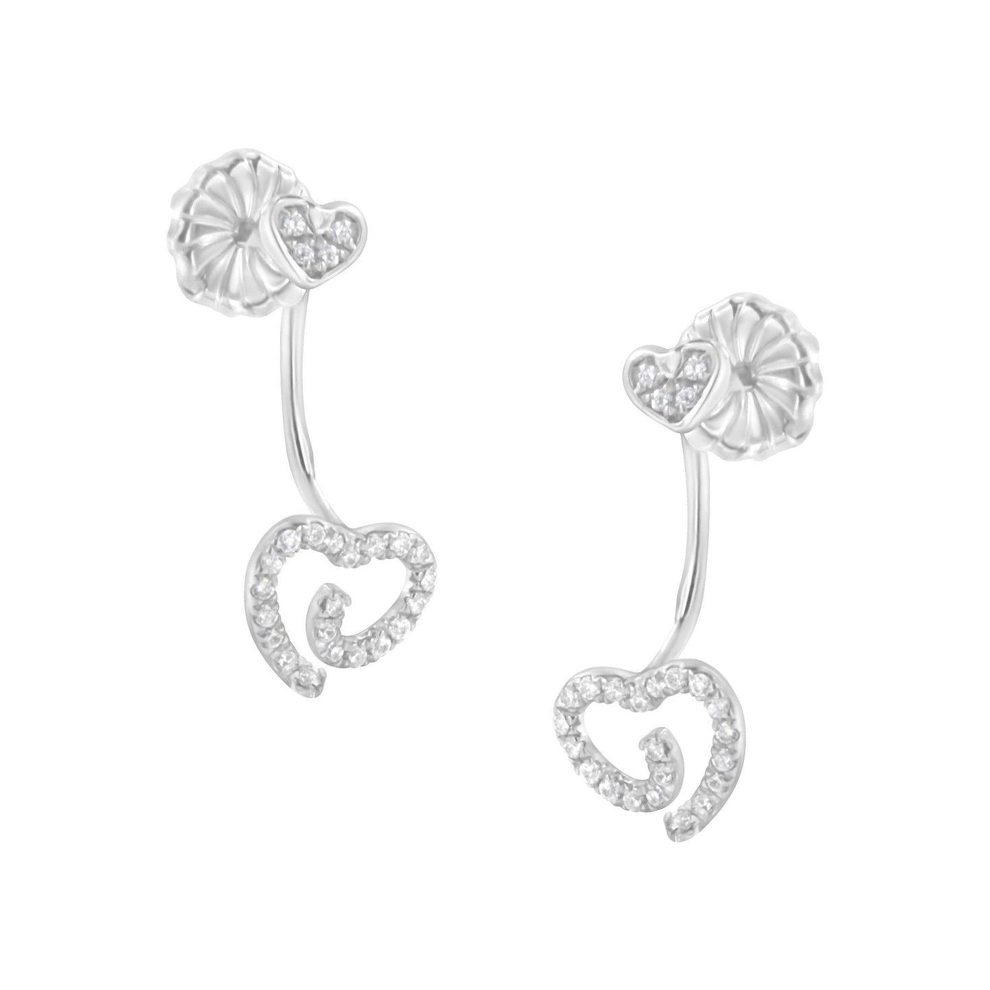 White metal earrings with heart-shaped designs adorned with white gemstones in pave setting, shown from a slightly angled front view.