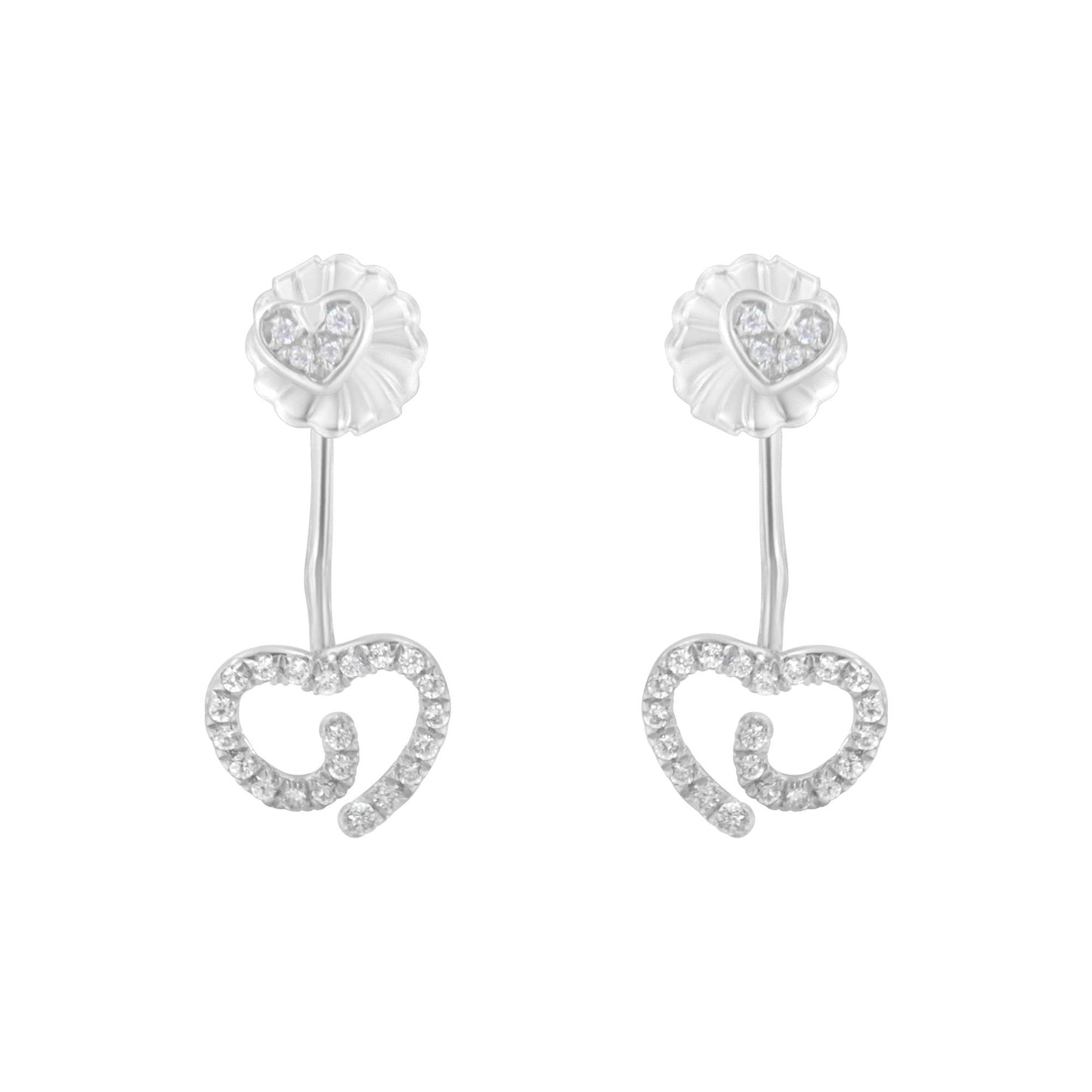 Front view of white metal earrings featuring a small heart with white gemstones at the top connected by a slender bar to a larger open heart shape outlined with white gemstones.