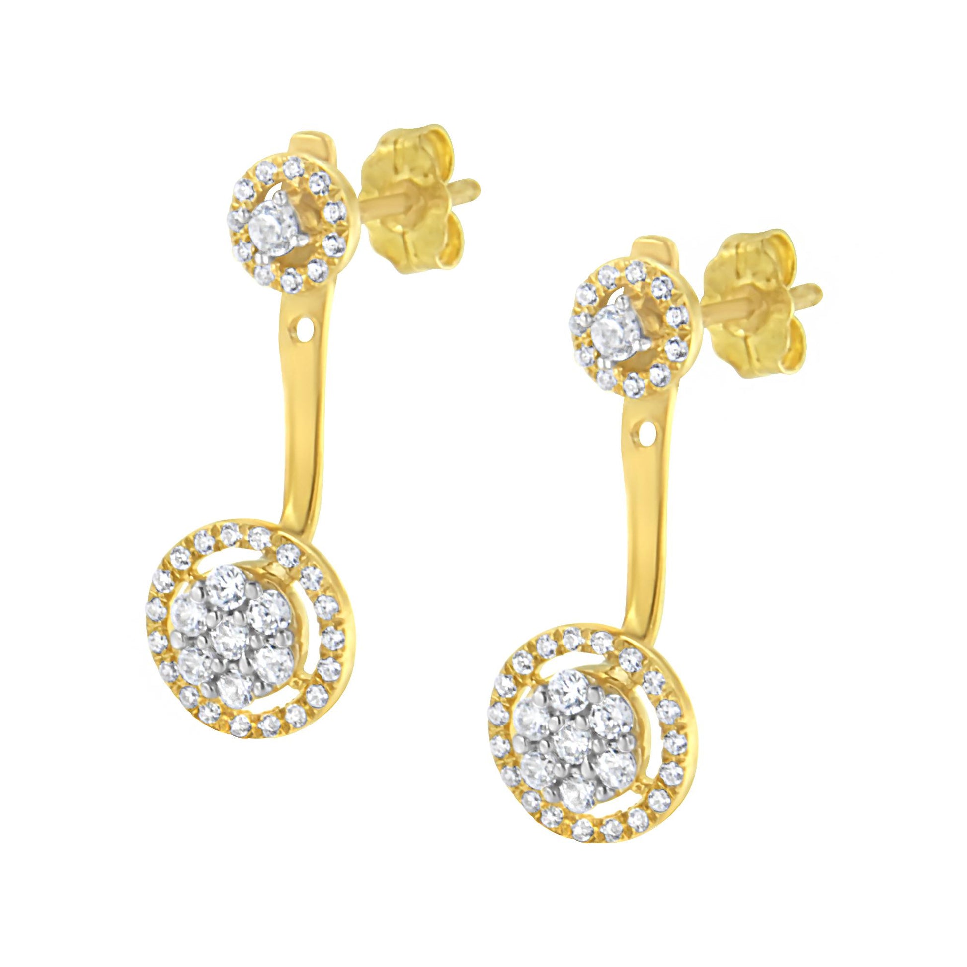 Pair of yellow metal drop earrings with two circular sections connected by a curved bar, each section adorned with white gemstones in prong settings, shown from a slightly angled front view.