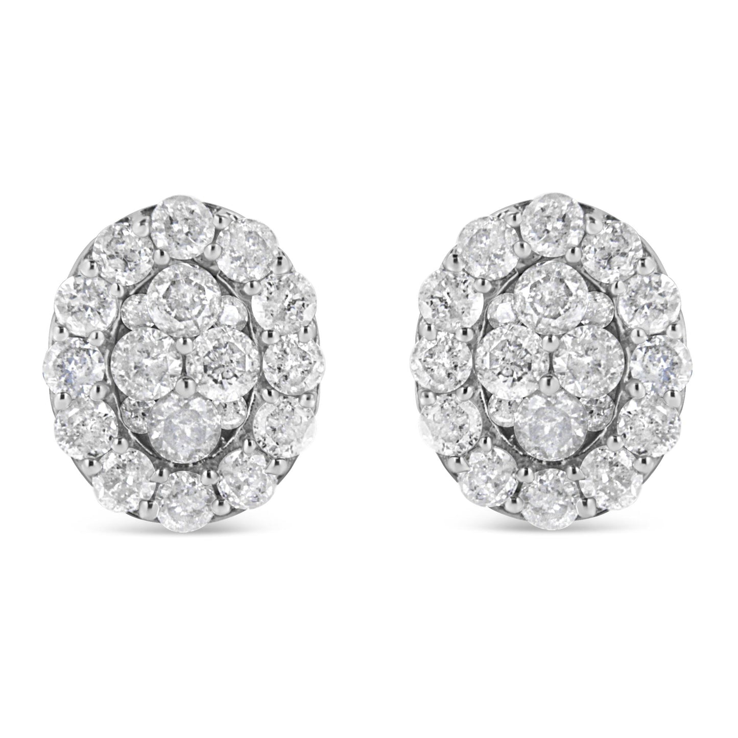 Front view of a pair of white metal stud earrings with round white gemstones in prong settings arranged in a cluster design.