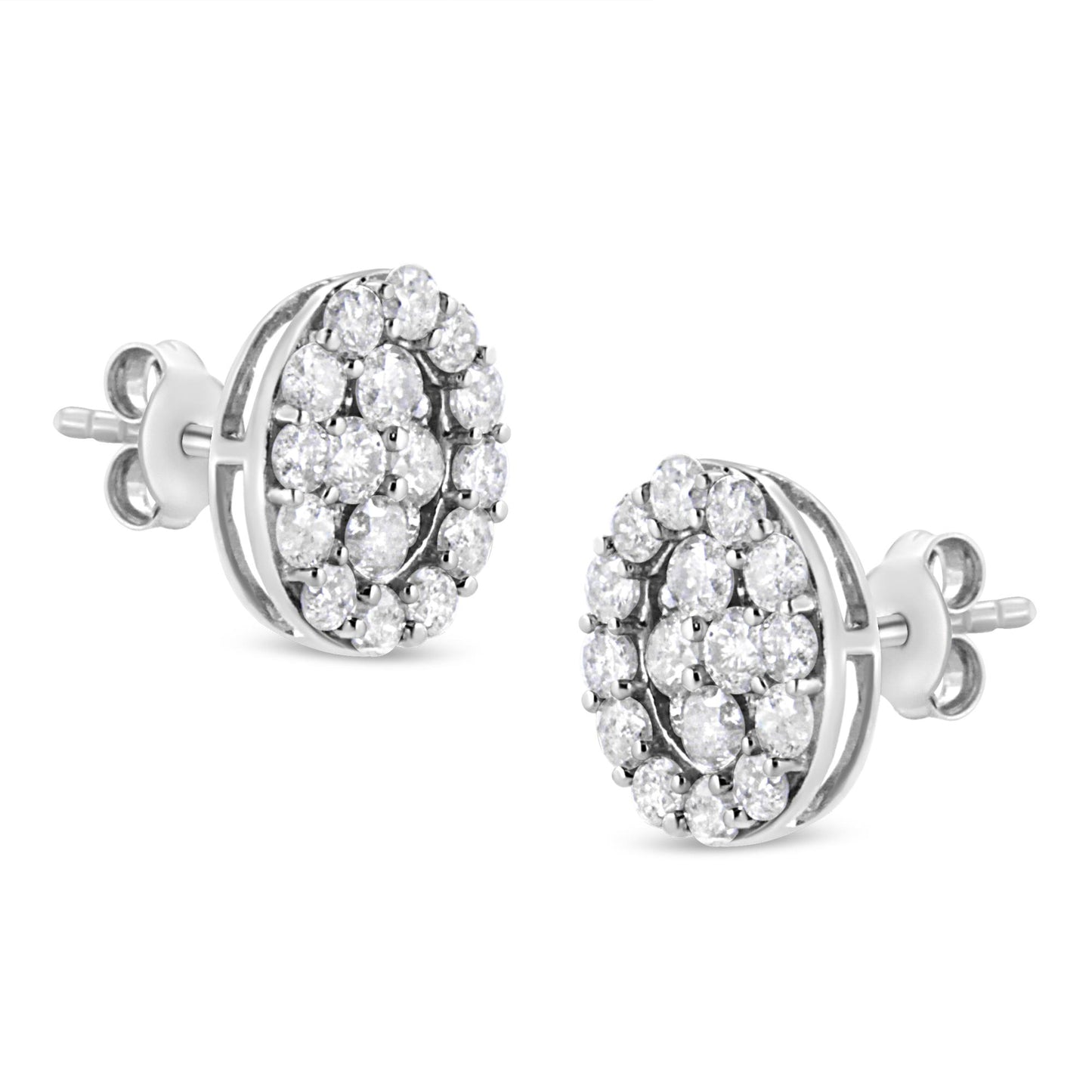 Pair of white metal round stud earrings with prong-set white gemstones, shown from a slight side angle.
