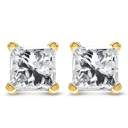 Front view of yellow metal stud earrings with square-shaped white gemstones in four-prong settings.