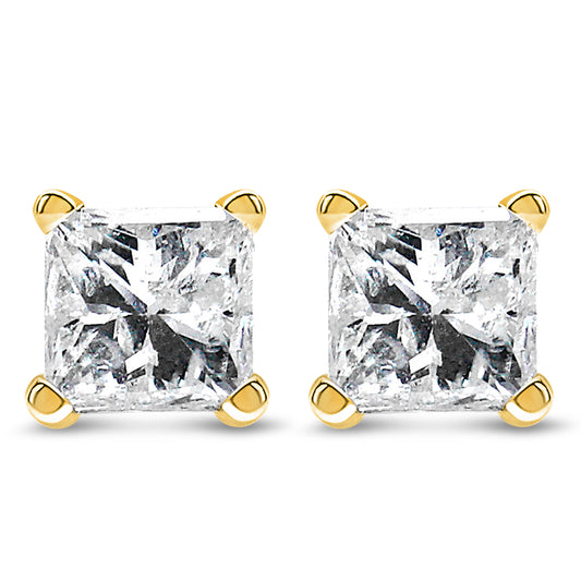 Front view of yellow metal stud earrings with square-shaped white gemstones in four-prong settings.