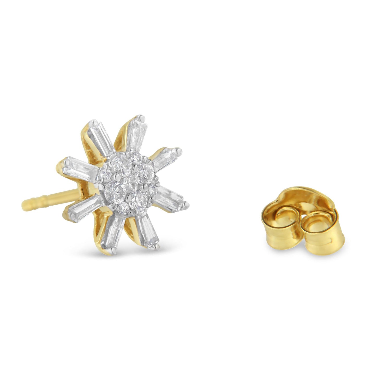 Close-up of yellow metal stud earrings with round and baguette white gemstones in prong settings, shown from a front angled view with one earring back visible.