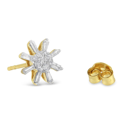 Close-up of yellow metal stud earrings with round and baguette white gemstones in prong settings, shown from a front angled view with one earring back visible.