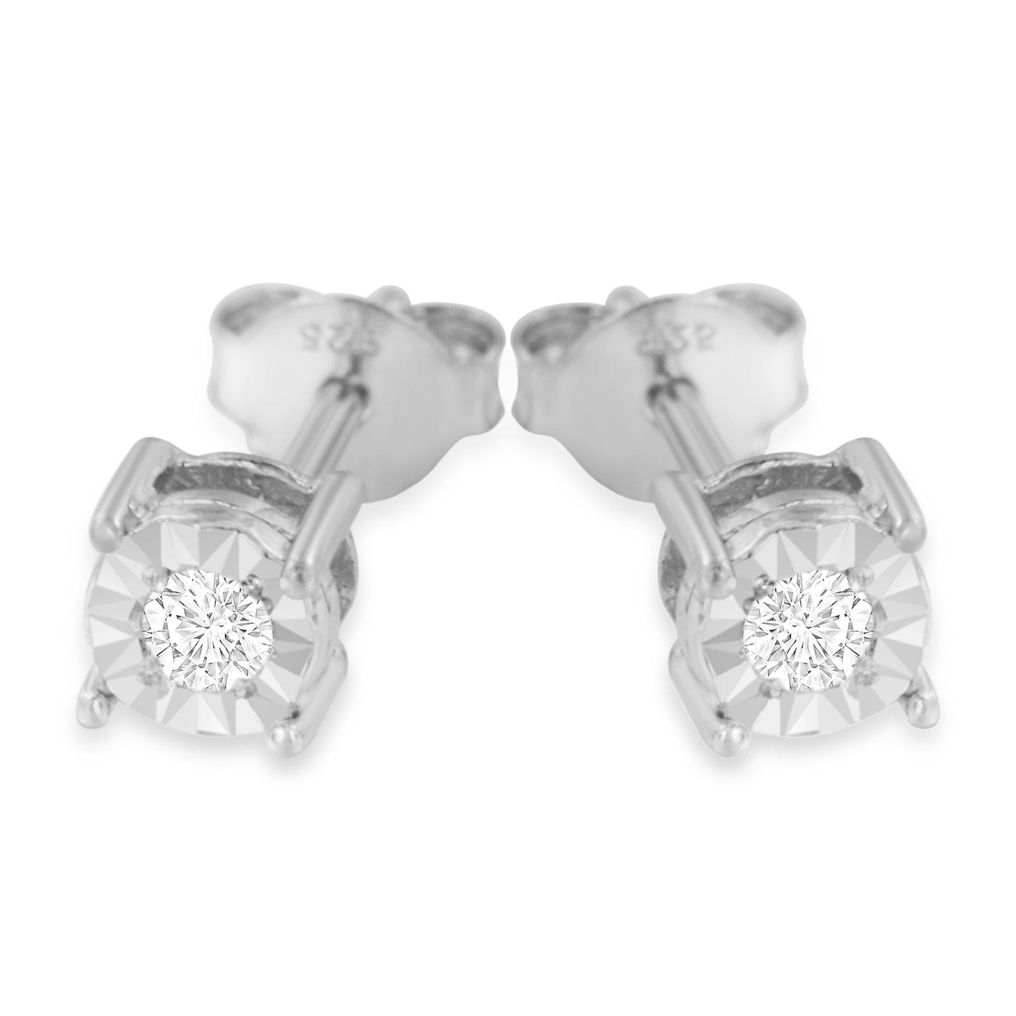 Close-up front view of a pair of white metal stud earrings featuring round white gemstones in a miracle setting.