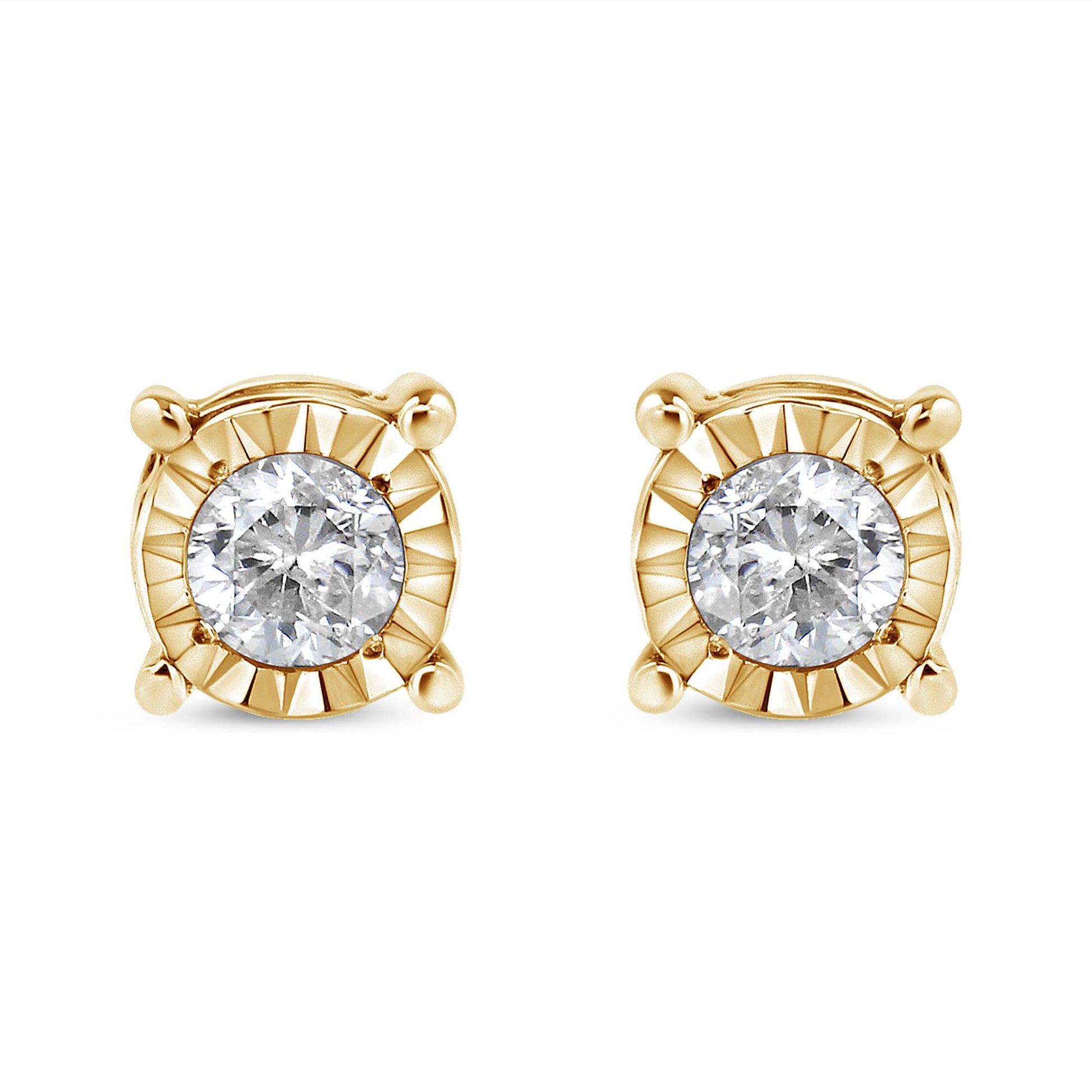 Front view of a pair of yellow metal stud earrings with round white gemstones in miracle settings.