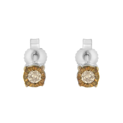 Front view of two-toned stud earrings each featuring a round champagne-colored gemstone in a miracle setting.