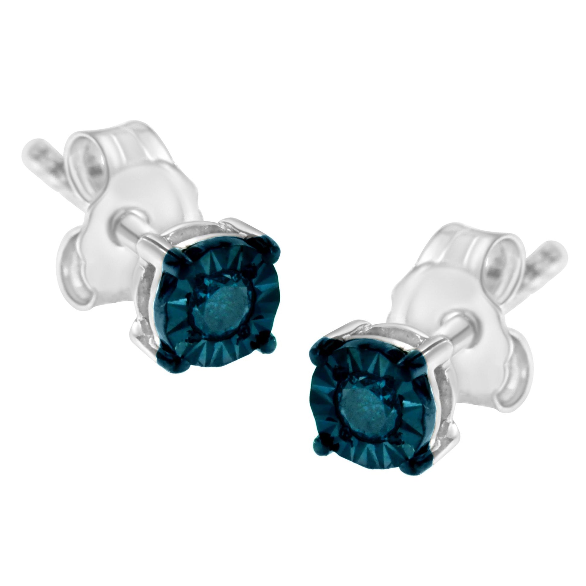 Close-up front angle of white metal stud earrings with round blue gemstones in miracle settings.