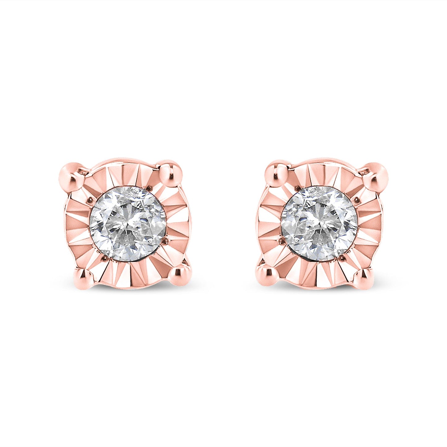 Pair of rose metal stud earrings with round white gemstones in miracle setting, front view on white background.