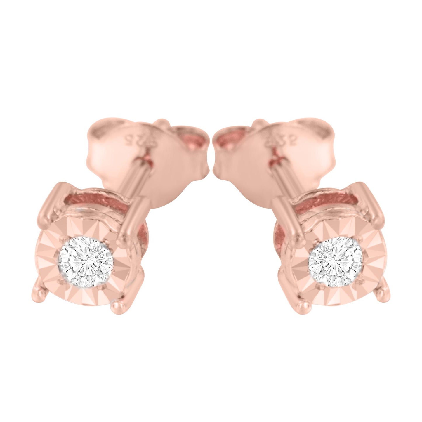 Close-up front view of a pair of rose metal stud earrings with round white gemstones in a miracle setting.