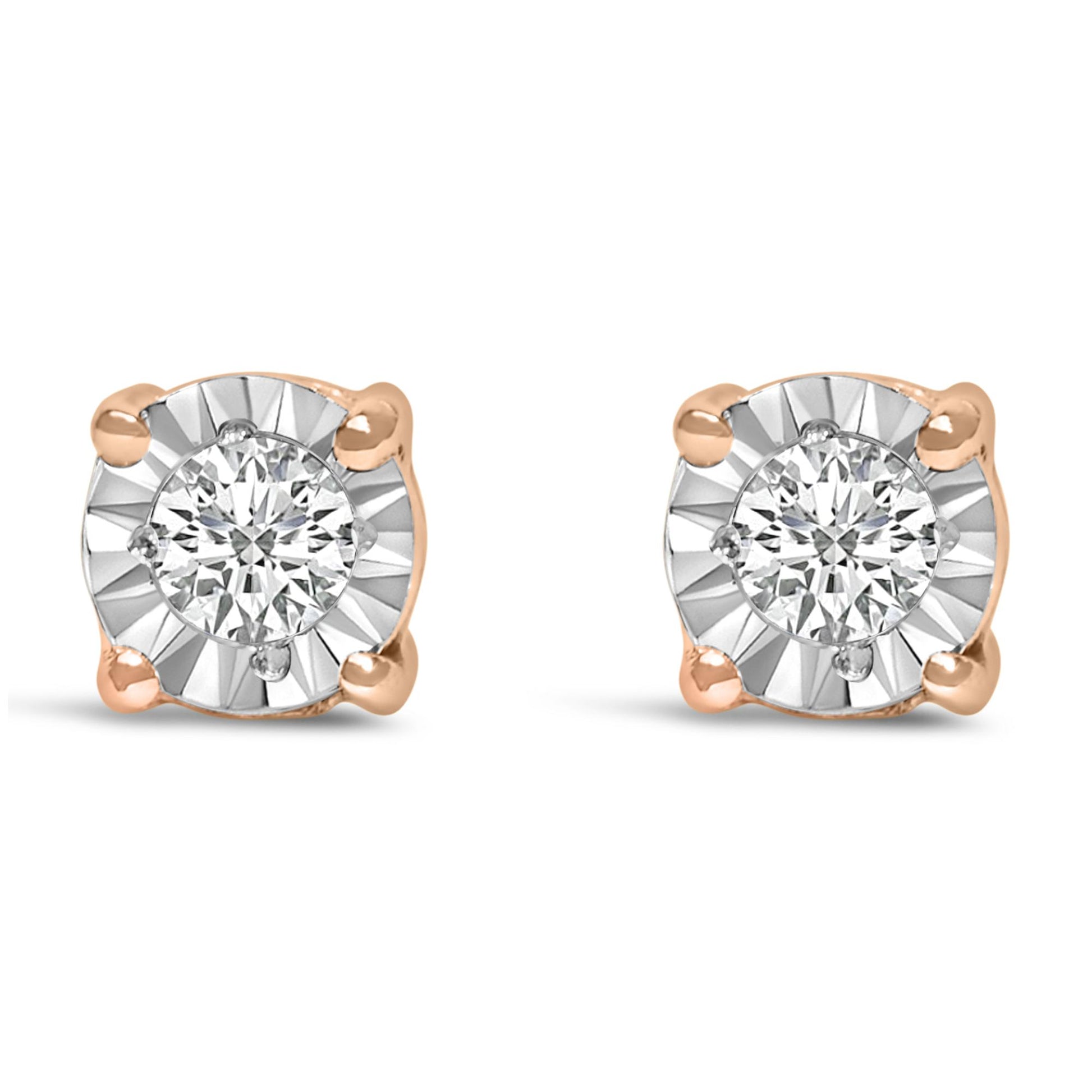 Front view of a pair of rose-colored stud earrings with round white gemstones set in a miracle setting.