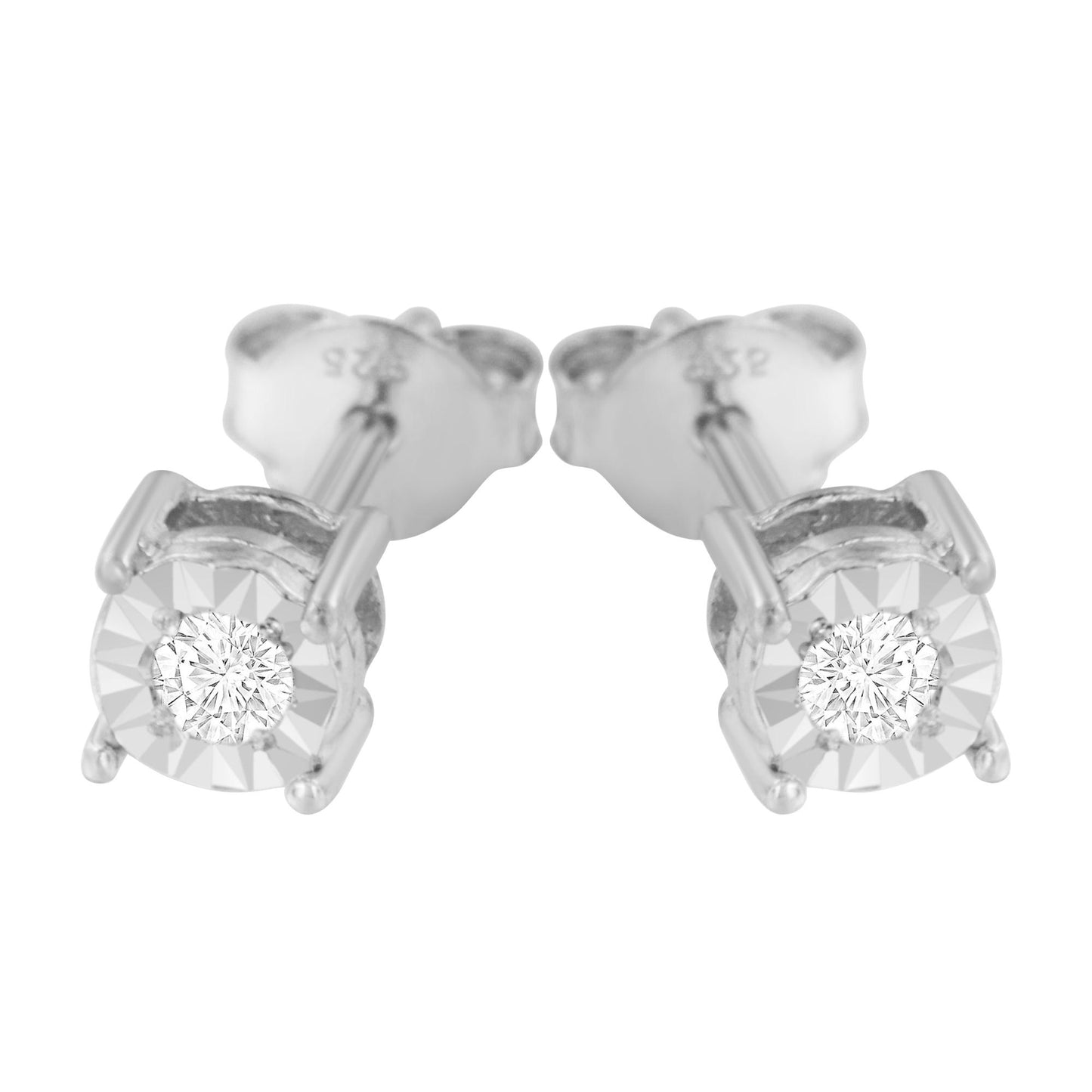 Close-up front angle of white metal stud earrings featuring round white gemstones in miracle settings.