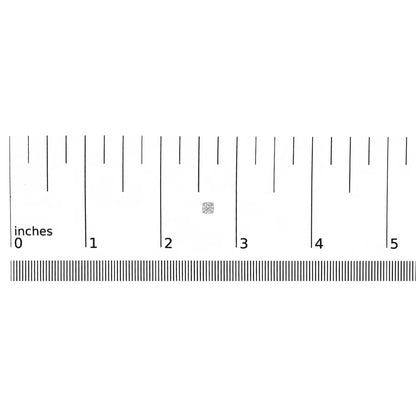 Close-up front view of small white metal stud earrings with round white gemstones, shown on a ruler for size reference.