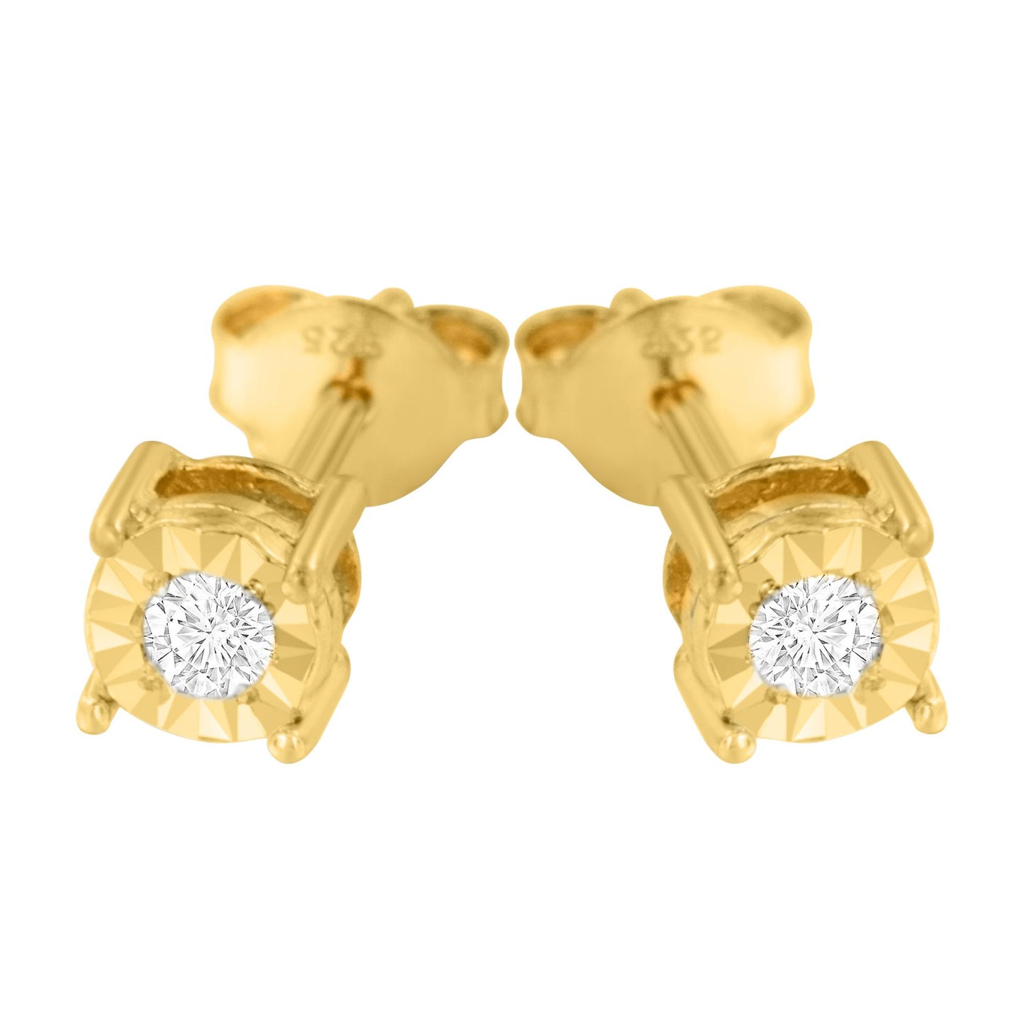 Close-up front angle of a pair of yellow metal stud earrings, each featuring a round white gemstone in mircale setting.