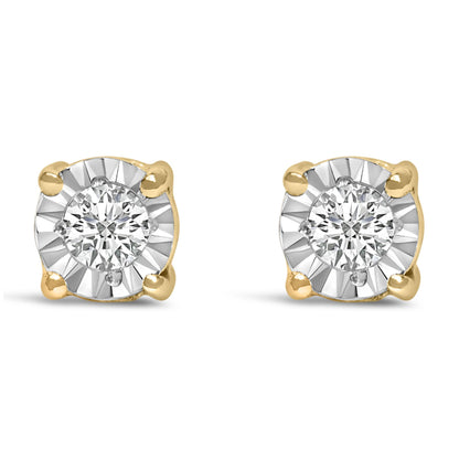 Front view of a pair of yellow metal stud earrings with round white gemstones in miracle settings.