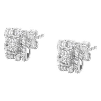 Pair of white metal stud earrings with square and round white gemstones in prong and invisible settings, shown at a slight side angle.