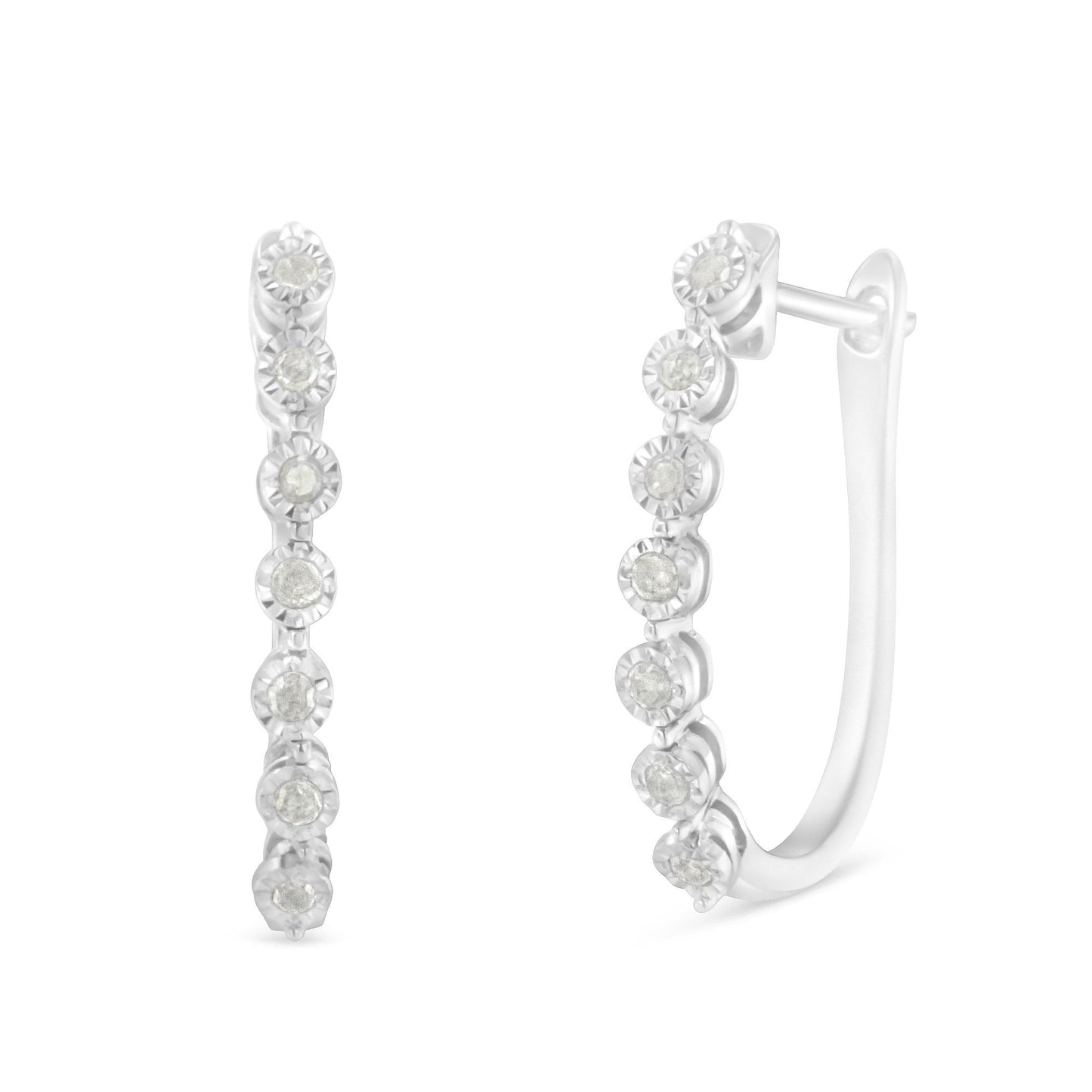 Front and side view of white metal hoop earrings with round white gemstones in miracle setting.